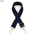 Detail of adjustable dark blue diamond pattern woven shoulder strap with gold metal hooks - Blue
