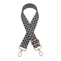 Dettaglio della tracolla in tessuto bianco e nero con motivi geometrici e ganci dorati - Chiusura in Argento / Piccolo Floreale Bianco e Nero (N. 10)