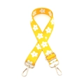 Close-up of yellow adjustable bag strap with white flower patterns and golden hooks - Yellow Flower
