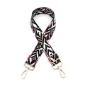Detail view of ethnic style No. 8 woven bag strap with red geometric pattern and gold clips - No.8 Black Red White