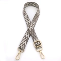 Detail of adjustable gray and beige chevron woven strap with golden lobster clasps - Dark Khaki