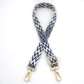 Detail of adjustable woven blue wave strap with gold metal lobster clasps for bags - Blue & White