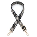 Detail of adjustable geometric black and white woven strap with gold metal hooks - Black Beige