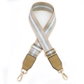 Close-up of adjustable striped fabric strap with leather ends and gold metal buckles - Khaki