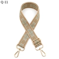 Detailed view of bohemian floral jacquard bag strap with golden metal carabiner clips - Khaki Matcha Green