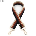 Detail of wide striped woven bag strap with retro orange and brown colors and gold buckle - C-13 Black Brown Stripes