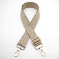 Detail of woven geometric bag strap in beige and brown with gold alloy rotating hooks - Silver Clasp / Light Khaki (No. 8) / [product Attributes] Visually This Is A Wide Fabric [bag Strap] Using A [geometric Pattern] Weave In [beige And Brown] Giving It A Substantial Feel. Both Ends Are Equipped With [light Gold Alloy] Rotating Buckles And Adjustment Buckles Suitable For Various Shoulder Bags. [visual Presentation] The Image Is Taken From Above Against A [pure White Background] With A Simple Layout. Quality Is [high] With Sharp Focus Clear Hardware Reflections And Clear Fabric Texture. Aesthetics Are [medium] Rating [7.2] Overall Presentation Is Rather Mediocre Lacking Atmosphere. [text Content] The To_remove Group Detected "8" Which Is A Chinese Serial Number Added Later; Removal Is Recommended. [logistics Tags] None. [infringement Risk] Product Infringement: None As It Is A General Accessory Style Risk Probability [0.0]. Background Infringement: None. [product Parameters] Includes Key Components Such As [fabric Strap Body] [metal Adjustment Buckle] And [double Rotating Hook].