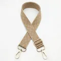 Close-up of woven bag strap in coffee and beige chevron pattern with gold metal clasps - Silver Clasp / Dark Khaki (No. 10) / [product Attributes] This Product Is A Widened Bag Replacement Strap Visually Made Of Canvas Or Synthetic Fiber. The Strap Features A Light Coffee And Off-white Diamond/twill Interwoven Pattern Presenting A Delicate Wavy Woven Texture. Both Ends Are Equipped With Light Gold Metal Lobster Buckles And Adjustment Buckles. The Metal Parts Have A High Gloss Surface And The Overall Style Is Simple And Modern. [visual Presentation] The Image Is Taken From Above Against A Pure White Background With The Layout Centered. Image Quality Is [high] With Clear Texture Details And Accurate Exposure. Aesthetics Are [medium] With An Overall Score Of [7.2]. The Presentation Is Rather Mediocre And Lacks Contextual Emotional Guidance. [text Content] The Upper Left Corner Contains An Independent Floating Chinese Number "10" Which Is A B-end Product Number Information That Needs To Be Removed. [logistics Label] None. [infringement Risk] Product Infringement: None Visually Appears To Be A Common Woven Pattern; Background Infringement: None. [product Parameters] The Specific Length Or Width Is Not Indicated In The Image But The Widened Webbing Structure And Adjustable Function Are Visible.