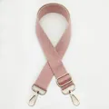 Close-up of pink and beige woven herringbone shoulder strap with gold swivel hooks - Silver Clasp / Pink (No. 15) / [product Attributes]: This Appears To Be A Stylish Widened Shoulder/crossbody Bag With A Replacement Shoulder Strap. The Strap Features A Geometric Herringbone Pattern In Pink And Beige And Appears To Be Made Of High-density Polyester Or Cotton Webbing. Both Ends Are Equipped With Gold-tone Metal Rotating Hooks And Adjustable Square Metal Sliding Buckles Showcasing Fine Craftsmanship. [visual Presentation]: The Image Is Shown Against A Pure White Background Taken From Above. The Composition Uses A Classic Crisscross Circular Arrangement Symmetrically Centered. Image Quality Is Rated [high] Sharp With No Noticeable Color Distortion. Aesthetics Are Rated [medium] With An Overall Score Of [7.2]. It's A Standard Commercial White Background Image Clear But Lacking In Atmosphere. [text Content]: The Upper Left Corner Contains The Chinese Number "15" Which Is An Internal Seller Item Number And Should Be Removed Using The [to_remove] Tag. [logistics Tags]: None [infringement Risk]: Product Infringement: None. Background Infringement: None. Infringement Probability: 0.0. [product Parameters]: Style Number: 15.