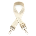 Details des verstellbaren beigen Nylon-Schultergurts mit Goldschnallen und Webmuster - Goldschnalle / Gebrochenes Weiß