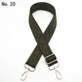 Close-up of adjustable woven shoulder strap in dark green and black chevron pattern - Silver Clasp / Black and Army Green (No. 20) / 【product Attributes】this Product Is A 【wide Woven Bag Strap】featuring A 【geometric Diagonal Stripe Pattern In Dark Green And Black】 Visually Estimated To Be Made Of Polyester-cotton Or Nylon Offering Good Wear Resistance. Accessories Include 【light Gold Metal Hardware】 Featuring Two Rotating Hooks And An Adjustable Square Buckle. The Overall Style Leans Towards Retro And Casual. 【visual Presentation】the Image Uses A Standard 【white Background】photograph With The Product Placed Centered In A Crisscross Pattern Resulting In A Neat Composition. Image Quality Is 【high】 With Clear Details And Accurate Exposure. Aesthetic Appeal Is Rated 【medium】 With A Score Of 【7.2】 Primarily Due To A Slightly Monotonous And Undecorated Background. 【text Content】the Upper Left Corner Is Marked With "20" Categorized Under The To_remove Group Requiring Removal Later. 【logistics Labels】none. 【infringement Risk】no Infringement Is Detected; The Geometric Pattern Is A Generic Design. No Background Infringement Is Detected. 【product Parameters】the Image Only Shows Style Number "20".