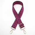 Detailed view of woven pink and black geometric pattern strap with gold metal buckles - Silver Clasp / Black and Rose Red (No. 22) / 【product Attributes】this Product Is A Woven Bag Strap/replacement Shoulder Strap. Visually It Appears To Be Made Of Thickened Woven Material With A Pink And Black Geometric Pattern Giving It A Strong Decorative Appeal. It Features An Adjustable Gold-plated Metal Buckle And Two Rotating Lobster Buckles Suitable For Various Backpack Types. The Model Number Is 22. 【visual Presentation】the Product Is Displayed Symmetrically In A Crisscross Pattern Against A Pure White Background Creating A Neat Composition. The Light And Shadow Are Evenly Distributed And Details Are Clearly Displayed. The Image Quality Is High With No Noise. Aesthetic Appeal Is Rated Medium With An Overall Score Of 7.8. The Main Issue Is That The Pure White Background Is Somewhat Monotonous And Lacks A Lived-in Feel. 【text Content】the Text Is Concentrated In The Upper Left Corner And Belongs To The "22" Group (to_translate). Translation Is Recommended. 【logistics Tags】none. 【infringement Risk】product Infringement: None Probability 0.0; Background Infringement: None. 【product Parameters】color: Pink And Black; Accessory Color: Gold; Model: 22.