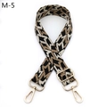 Detail view of adjustable woven bag strap with geometric patterns and golden metal hooks - M-5 Black Khaki