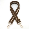 Detail of adjustable woven bag strap with brown stripe pattern and golden metal hooks - No.8 Coffee