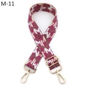 Close-up of adjustable woven shoulder strap with zigzag pattern and gold metal buckles - M-11 Rose Red