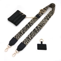 Close-up of leopard print wide strap with dual-zipper black pouch and gold hardware details - Gold Buckle / No.2 Gold Leopard + Black Leather