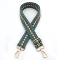 Close-up of wide bohemian woven shoulder strap with gold metal hooks and geometric pattern - No.10 Lake Blue