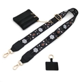 Detail view of adjustable floral embroidered shoulder strap with a zipper coin purse accessory - No.5 Black White Floral + Black Leather