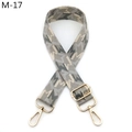Close-up of adjustable woven strap with grey geometric pattern and gold swivel hooks - M-17 Gray