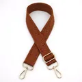 Detail of caramel brown herringbone woven bag strap with golden metal swivel hooks - Brown