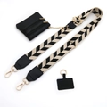 Close-up of adjustable crossbody strap with black and white arrow pattern and coin purse - No.10 Khaki Black Leaves + Black Leather