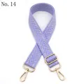 Detail of lavender woven shoulder strap with silver herringbone pattern and gold metal hooks - Light Purple