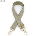 Detail showing green chevron patterned shoulder strap with gold metal hooks and buckle - Herringbone (C-10) / Silver Clasp / Matcha Green