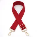 Detailed view of the dark red woven texture and golden lobster clasp on the bag strap - Silver Clasp / Red