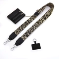 Detail von Leoparden-Taschengurt mit schwarzer Geldbörse und silbernen Beschlägen - Nr. 7 Gold Leopard + Schwarzes Leder