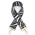 Detail of wide zebra striped replacement bag strap with golden metal lobster clasps - No. 7 Black Grey
