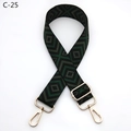 Detail view of adjustable wide purse strap with dark green geometric diamond pattern and gold buckle - Silver Clasp / Black Green (C-25)