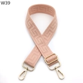 Detail of adjustable wide woven bag strap in pale pink with geometric greek key pattern - Pink (W39)