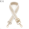 Dettaglio di tracolla ricamata geometrica regolabile con ganci in metallo dorato premium - Fibbia Oro / C-1 Bianco Sporco