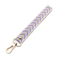 Close-up of cream wristlet strap with purple leaf embroidery and gold lobster clasp - Light Purple