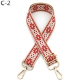 Dettaglio tracolla beige tessuta con motivo rosso e ganci in metallo dorato regolabili - Fibbia Oro / C-2 Rosso