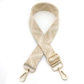 Detail of adjustable woven bag strap in beige and khaki with gold metal hooks - No.10 Beige