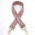 Close-up of pink and brown wave geometric pattern bag strap with gold lobster clasps - Gold Buckle / No.1 Flesh Pink