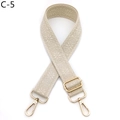 Close-up of adjustable beige embroidered bag strap with geometric patterns and gold clips - C-5 Beige
