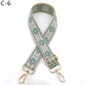 Close-up of ethnic jacquard shoulder strap with gold swivel hooks and blue floral patterns - C-6 Lake Blue