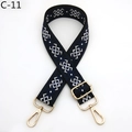 Close-up of adjustable bag strap with white geometric patterns and gold metal hooks - C-11 Black Blue