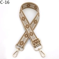Detail of woven bag strap with brown snowflake pattern and gold metal spring buckles - C-16 Khaki