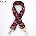 Detail of red and black geometric jacquard bag strap with golden metal lobster clasps - C-18 Black Red