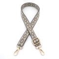 Detail of adjustable geometric diamond pattern shoulder strap with gold swivel hooks - Dark Khaki