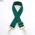 Detail of dark green woven strap with herringbone texture and gold metal hooks - Silver Clasp / Malachite green