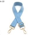 Close-up of baby blue chevron woven bag strap with gold-tone metal adjustable buckle - Silver Clasp / Light Blue
