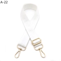 Close-up of white chevron woven shoulder strap with gold metal lobster clasps and buckle - Silver Clasp / White
