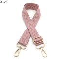 Close-up of pink-purple woven strap with herringbone texture and gold metal hardware - Silver Clasp / Lotus root pink