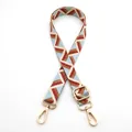 Detail of adjustable woven bag strap with red blue and gold geometric patterns and hardware - Style 11 Light Blue Beige Burgundy (Silver Buckle)