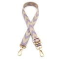 Detail of adjustable woven bag strap with purple chevron pattern and gold metal hooks - Cream Purple