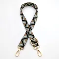 Detail of adjustable woven bag strap with geometric patterns and gold metal hooks - Style 17 Black Matcha Green (Silver Buckle)
